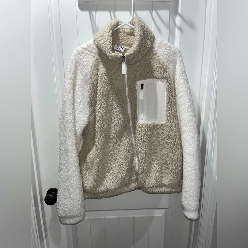 Very soft jacket. Zippers work great. Has a pocket.